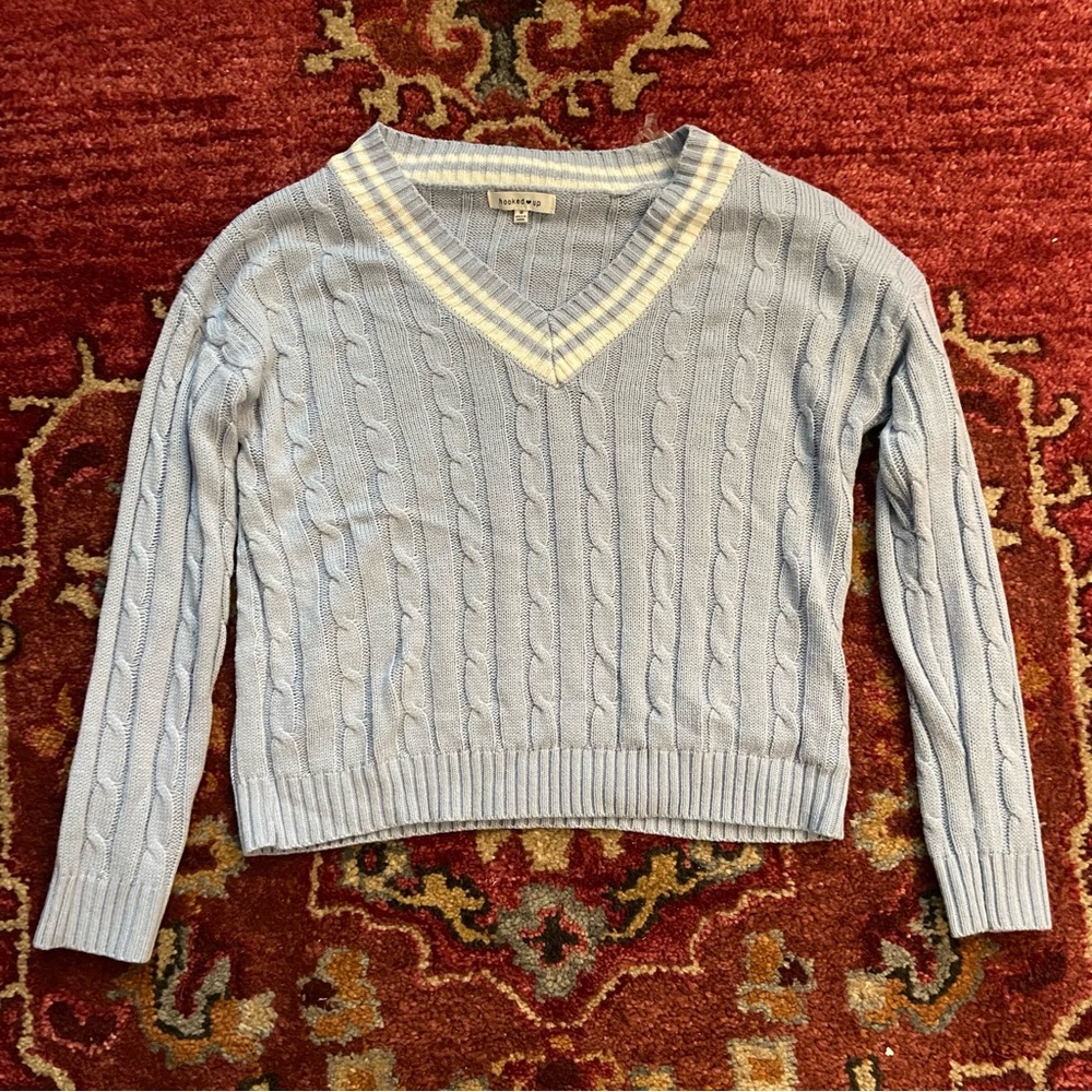 Macy’s “hooked up” pastel blue v-neck sweater (size medium)